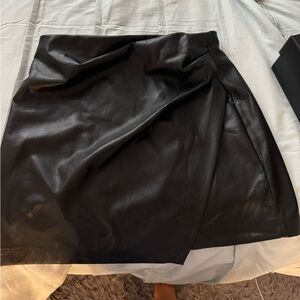 Two Aritizia sized 10 skirts